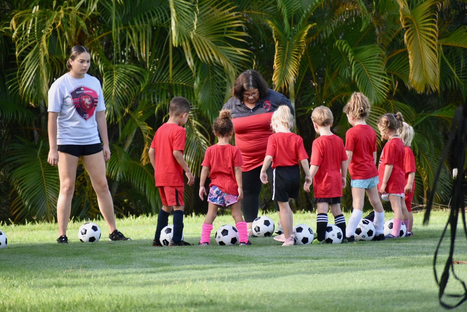 Another child playing soccer